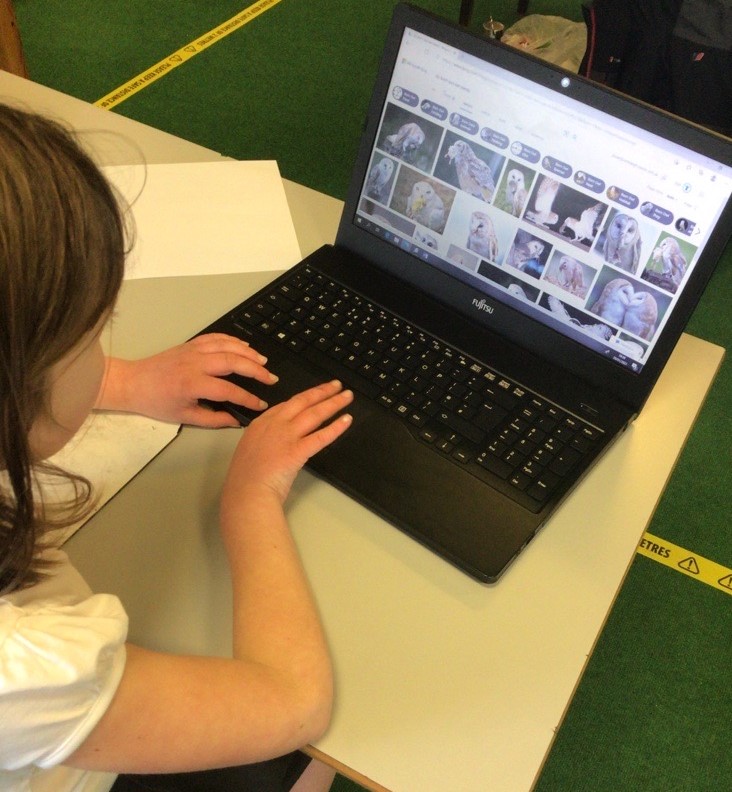 Child working on a laptop