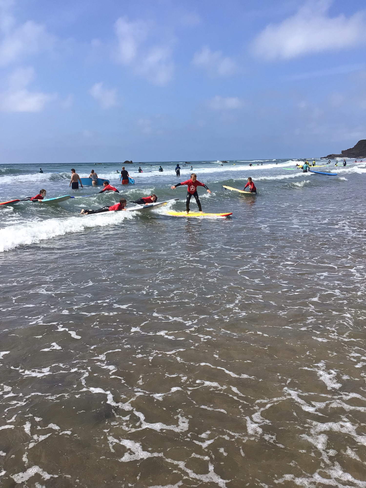 Child surfing in the sea